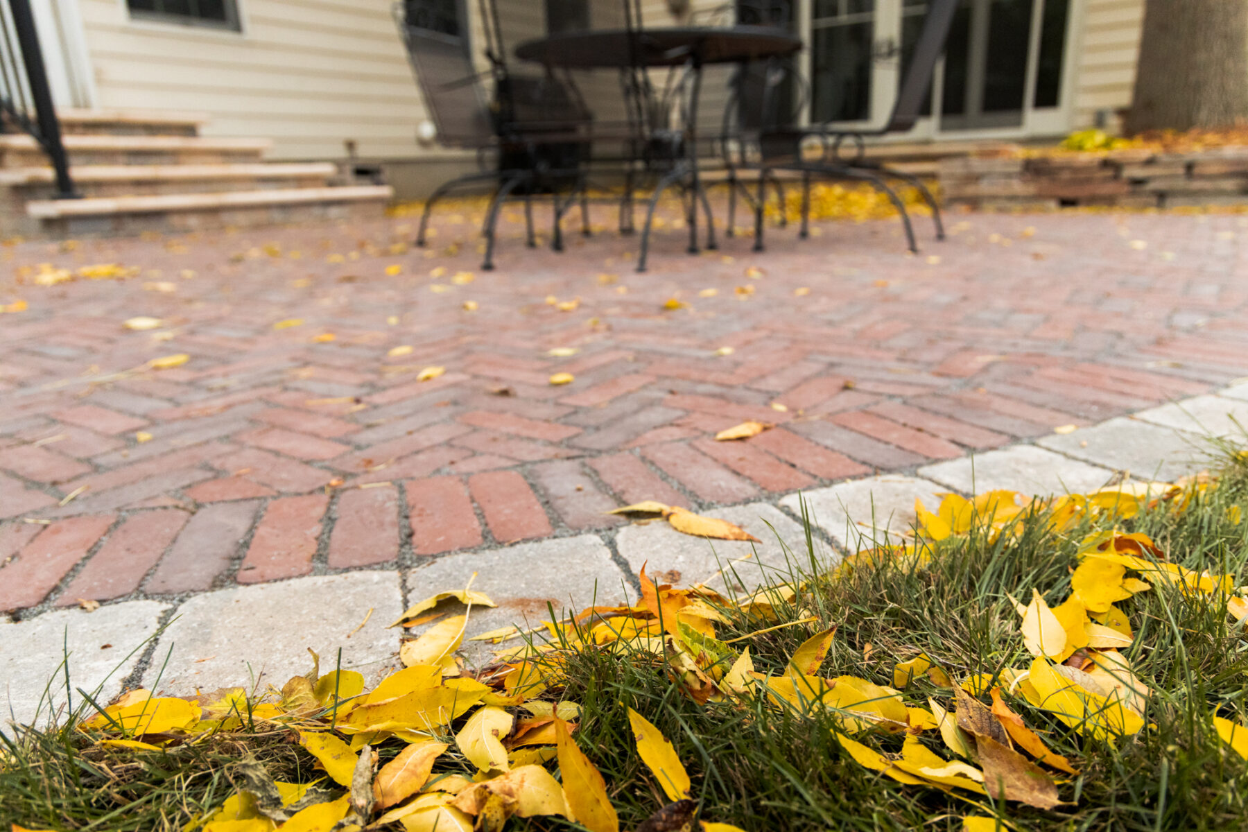 Fall leaves on Unilock pavers