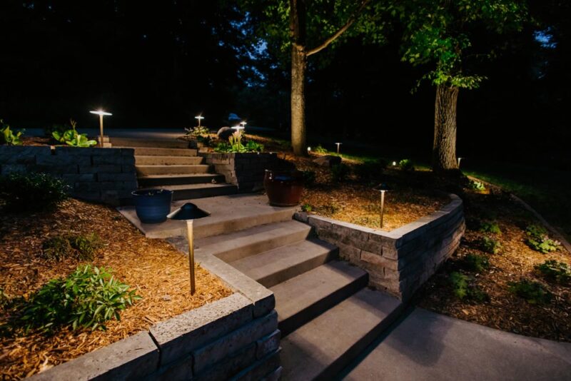 Retaining wall with stairs and landscape lighting, Weller Brothers Landscaping