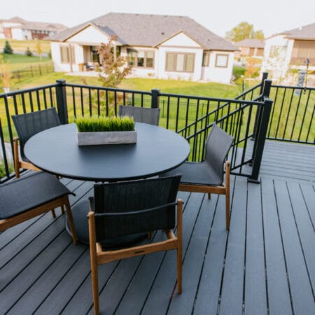 outdoor dining set on black patio