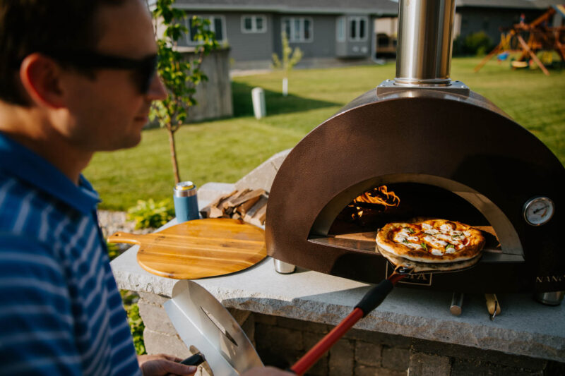 Outdoor Kitchen with a Pizza Oven, Weller Brothers Landscaping
