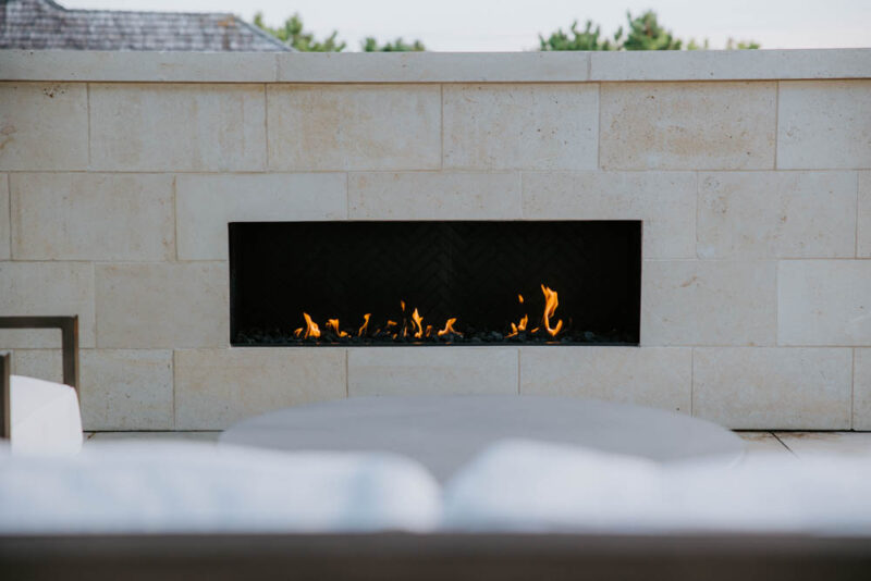 Elegant Fireplace in Mantel Outdoors, Weller Brothers Landscaping