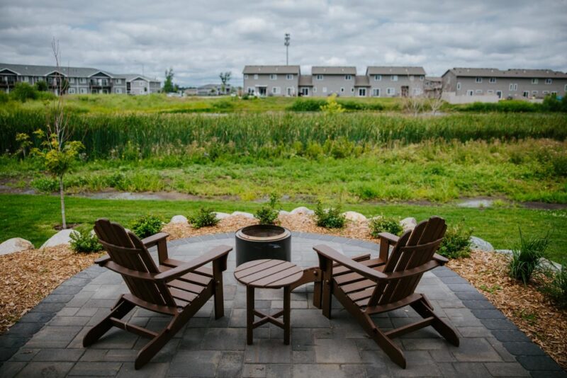 Patio with Firepit over looking back yard