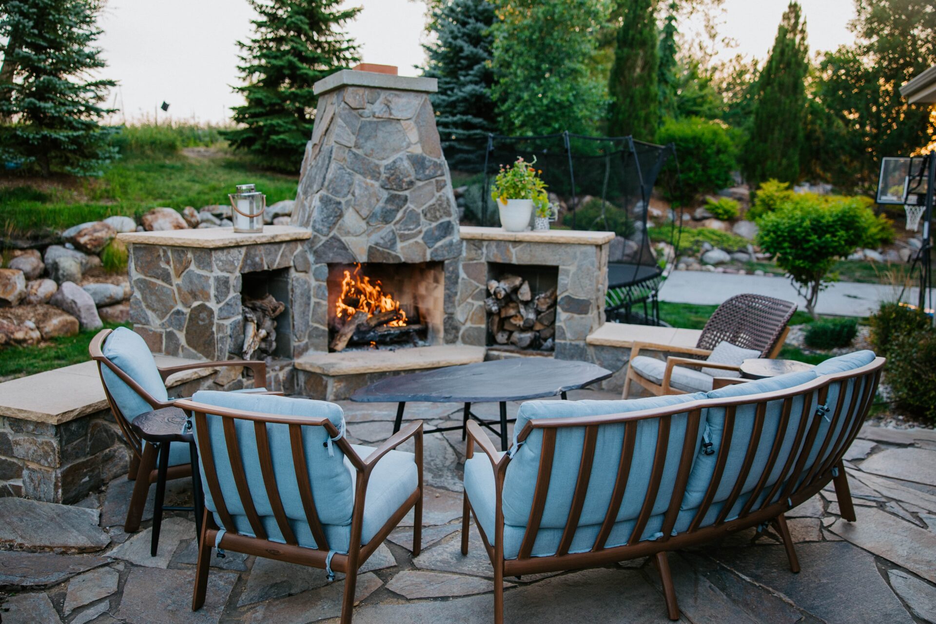 Outdoor Fireplace with Custom Outdoor Furniture and Patio