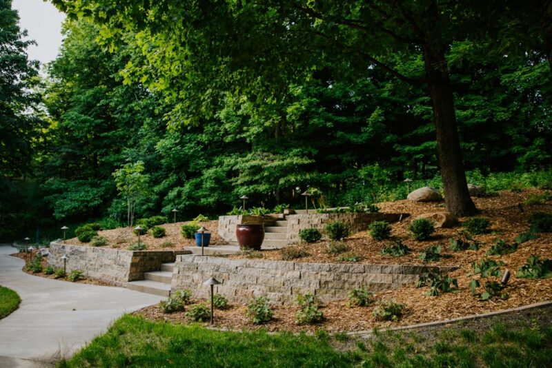Landscaping accent retaining wall with shrubs, Weller Brothers Landscaping