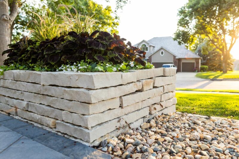 Raised Planters with flowers near road, Weller Brothers Landscaping