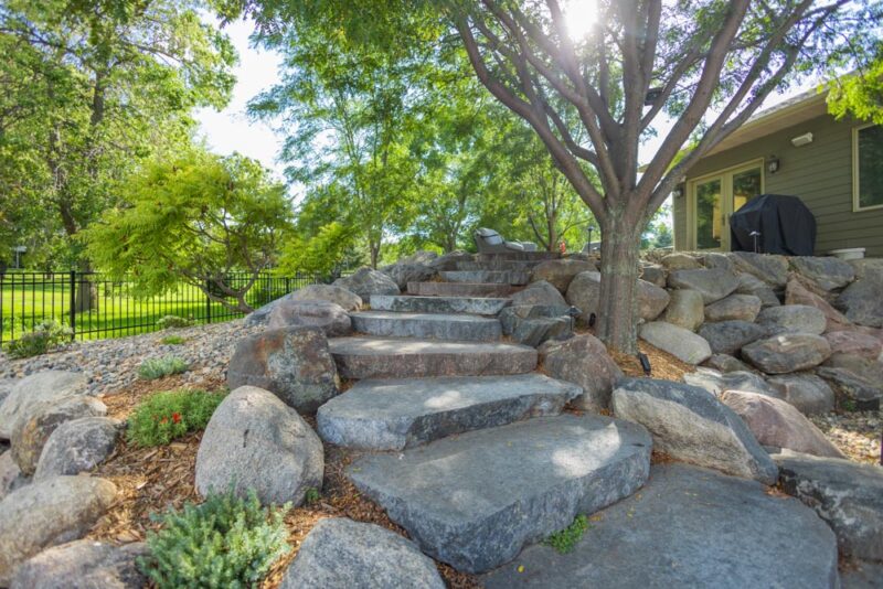 Large Rock slab retaining wall and stairs, Weller Brothers Landscaping