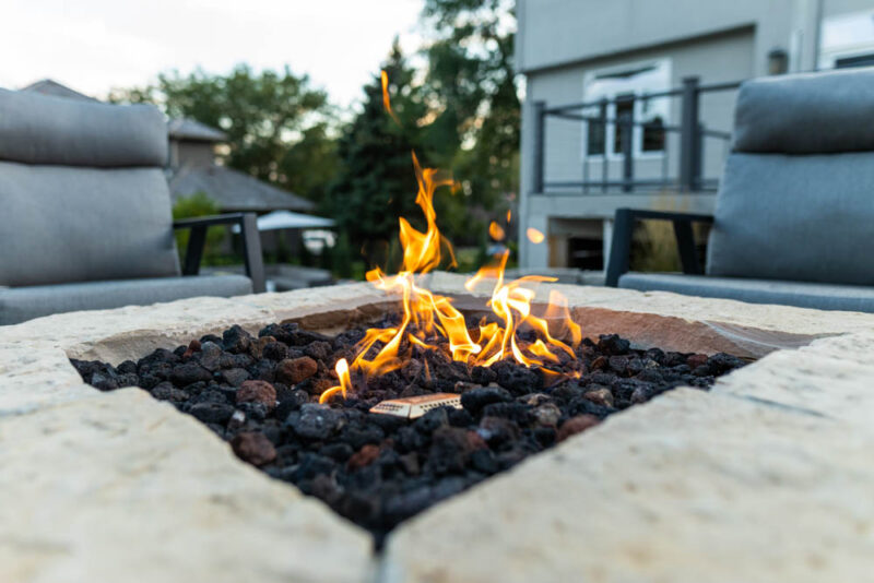 Lit outdoor firepit, Weller Brothers Landscaping