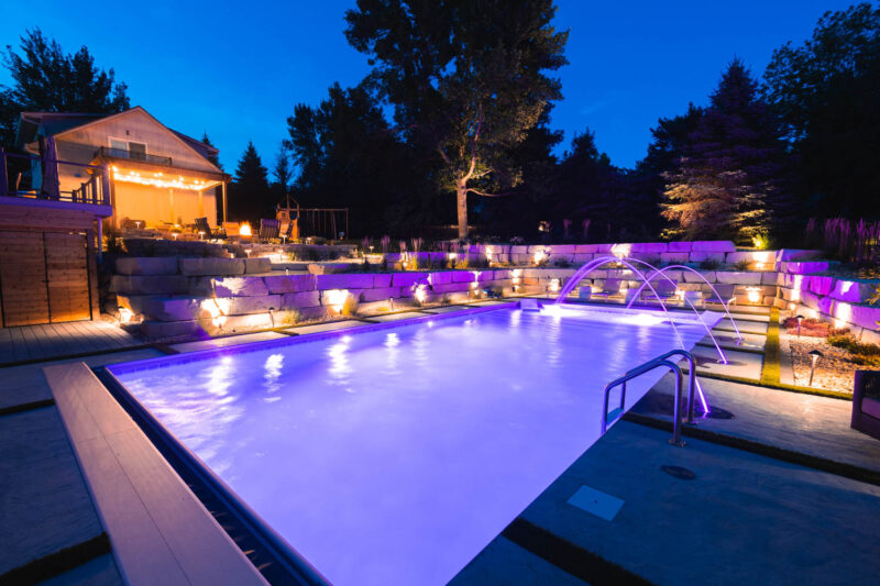 Landscape Lighting around a Pool and Patio, Weller Brothers Landscaping