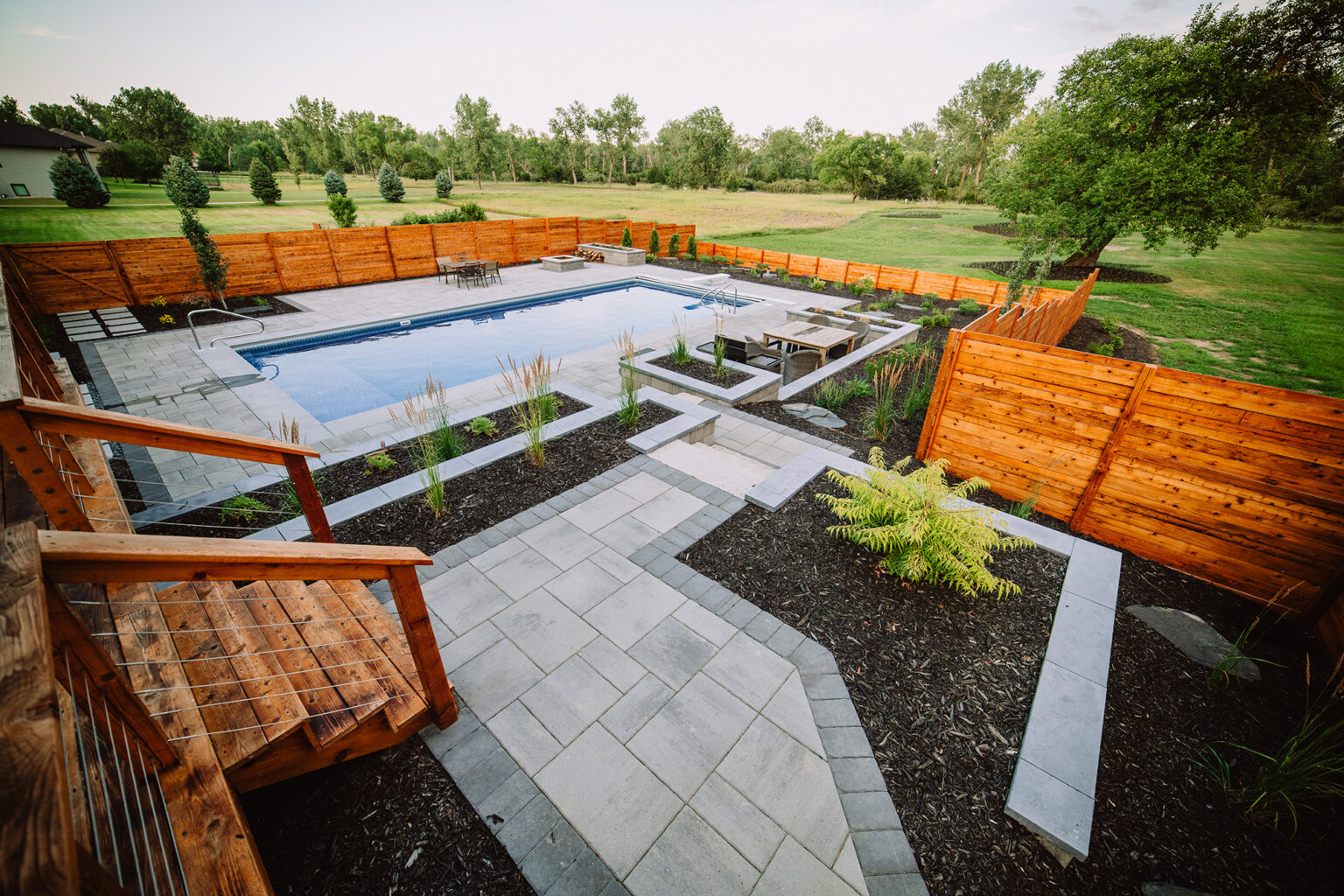 outdoor staircase with pool