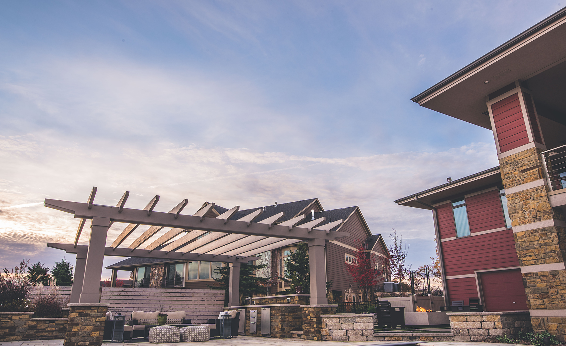 wideshot of backyard with pergola and modern patio