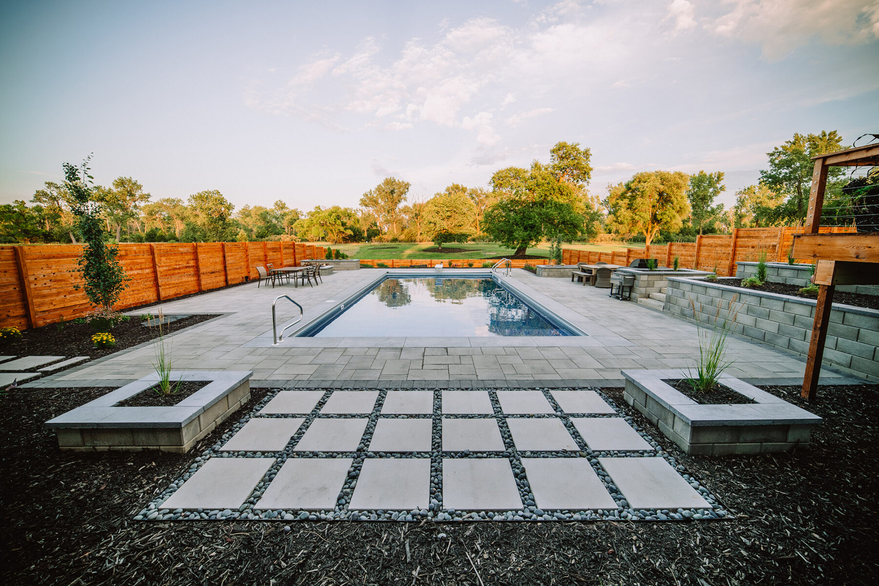 beautiful backyard landscaping with pool in the midwest