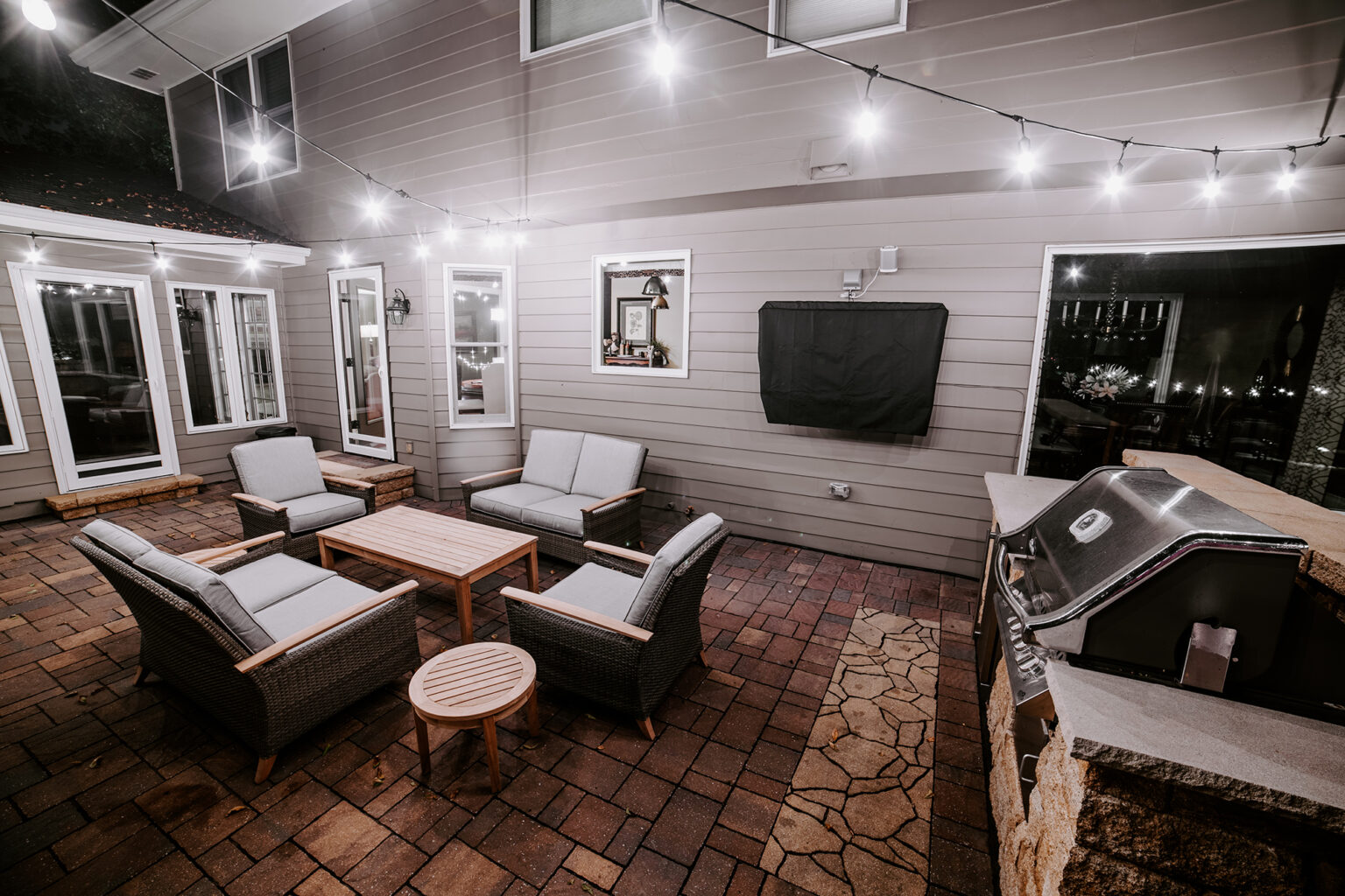 custom backyard patio at night