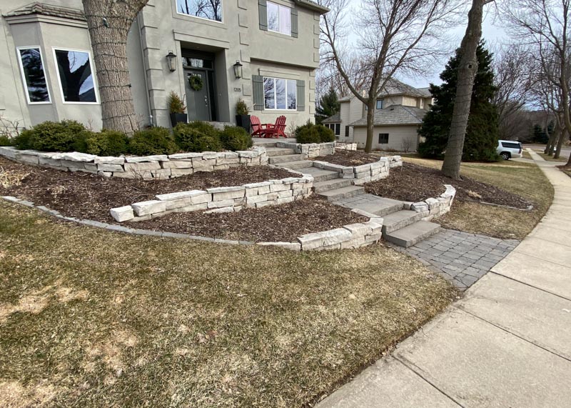 Front yard of a home with poor landscaping