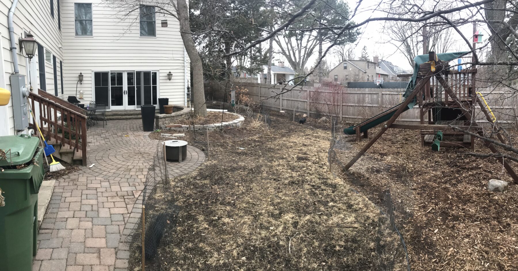 Before photo of a backyard patio