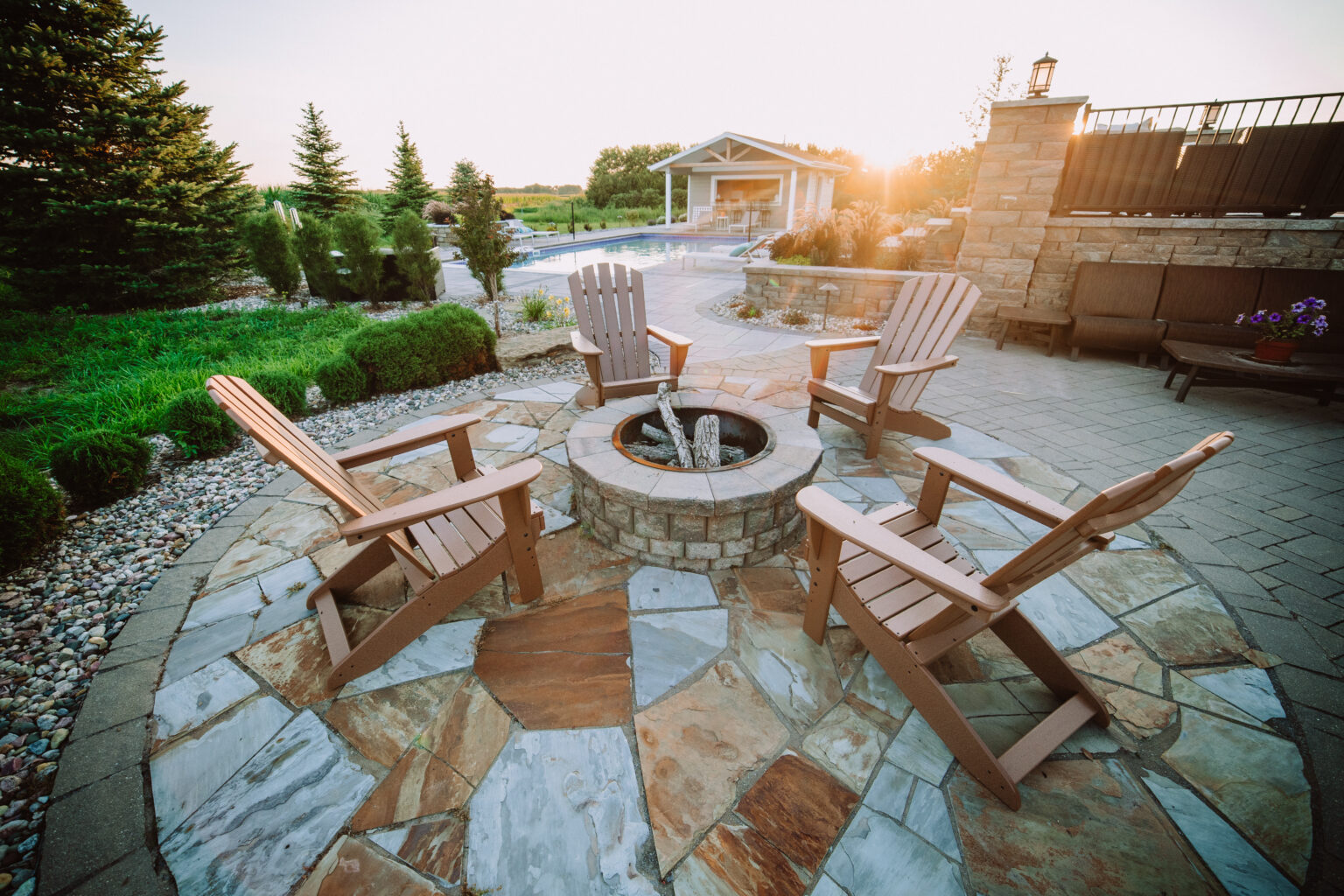 seating around cozy flagstone fire pit