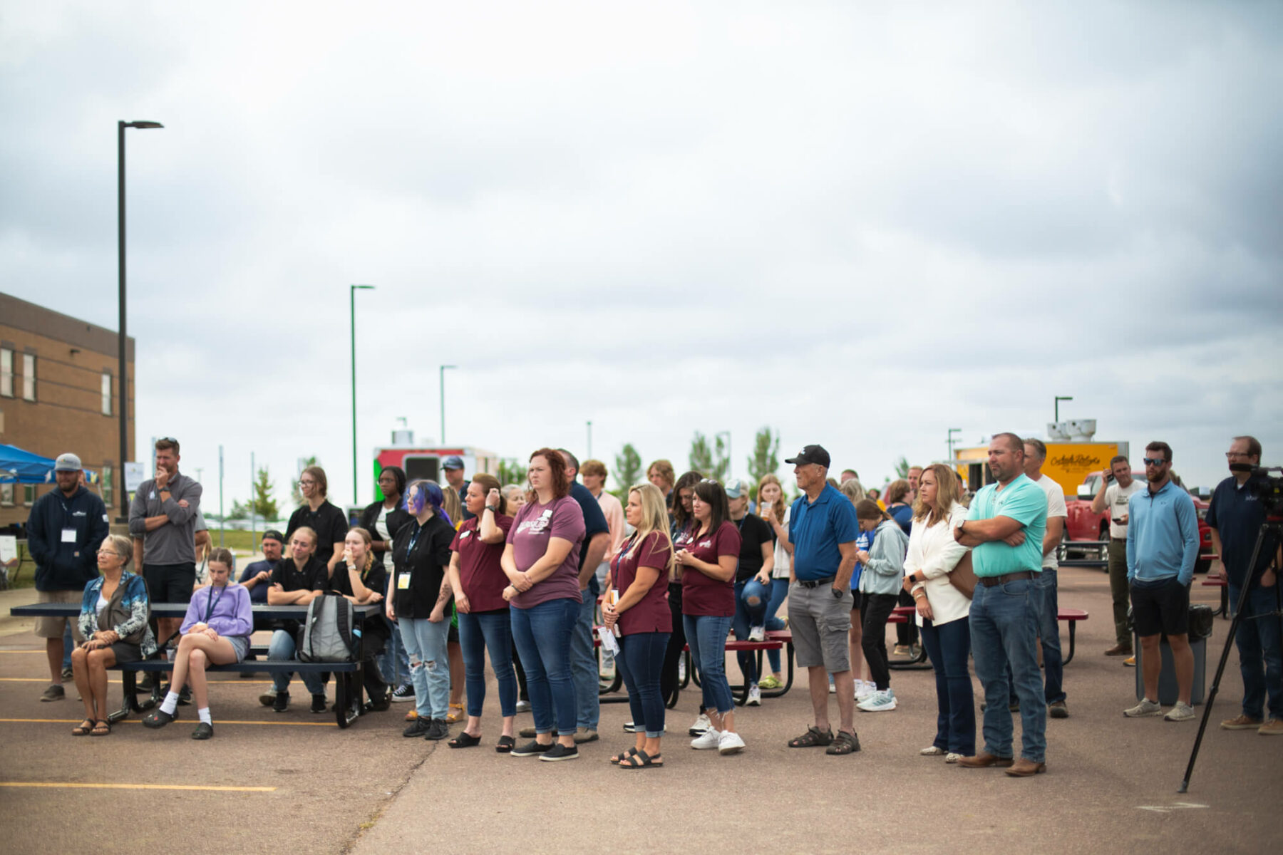 crowd watches at the Harrisburg greenhouse ribbon cutting