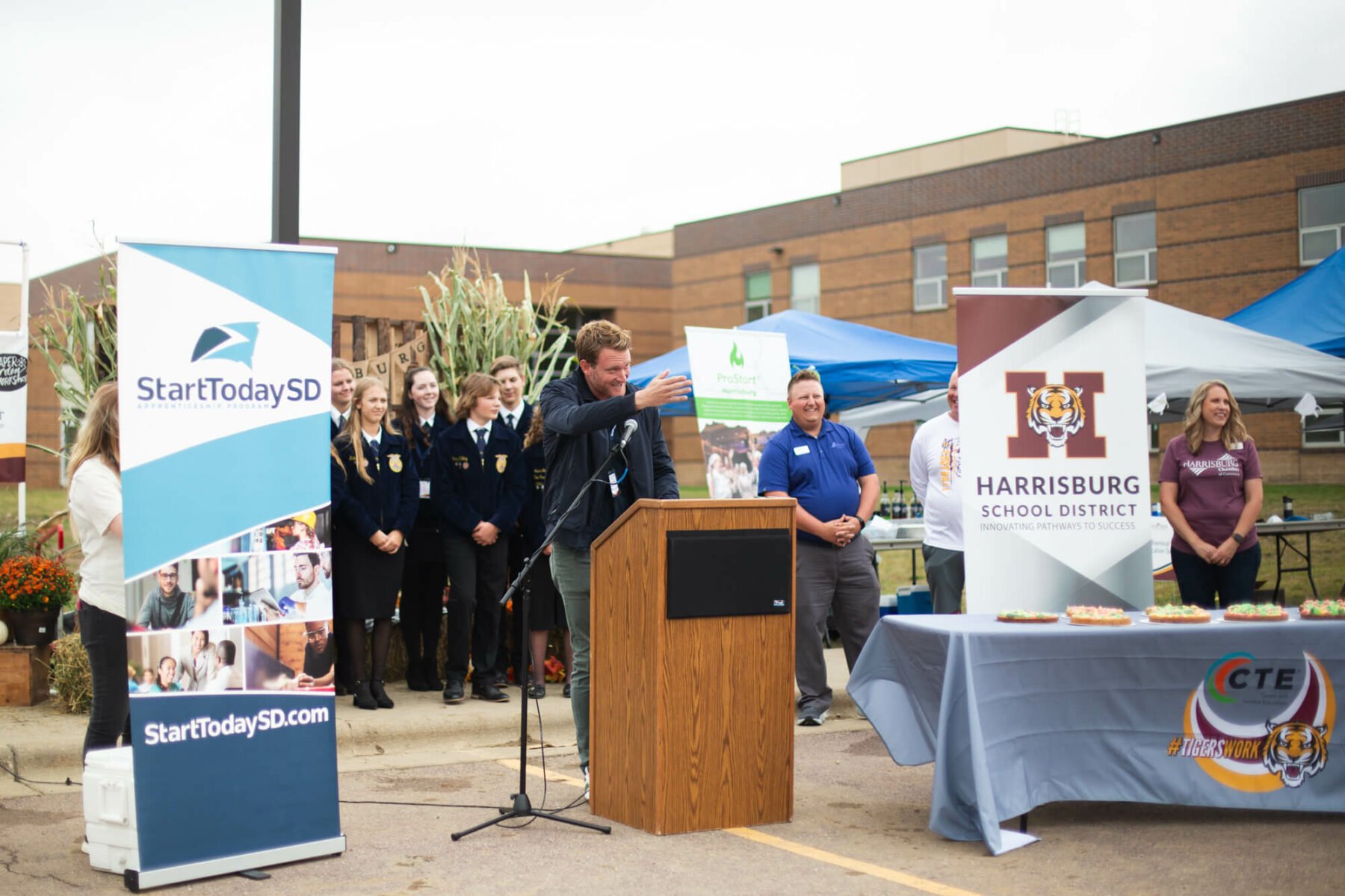 Cole Weller speaks at the Harrisburg greenhouse ribbon cutting