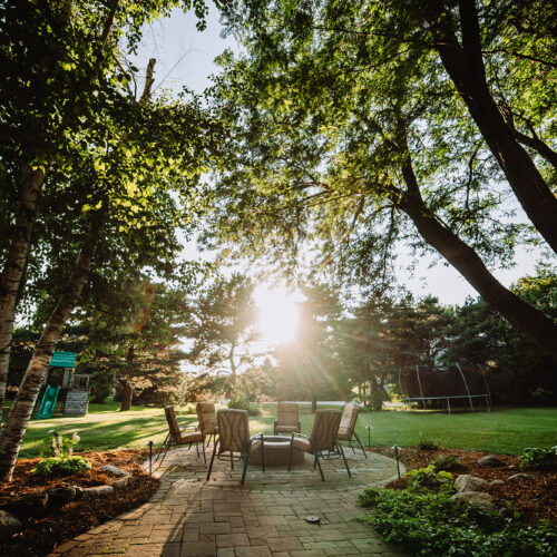 sunlit custom backyard by midwest landscape professionals