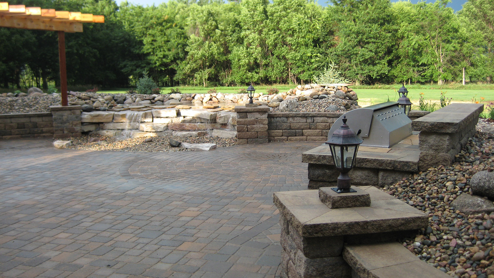large outdoor patio by Weller Brothers Landscaping
