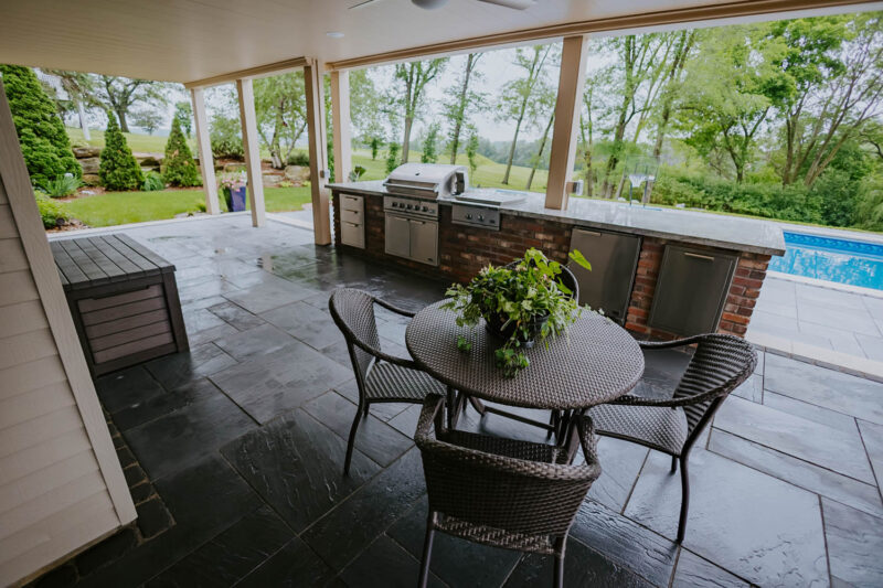Dining area Near outdoor Kitchen and Pool, Weller Brothers Landscaping