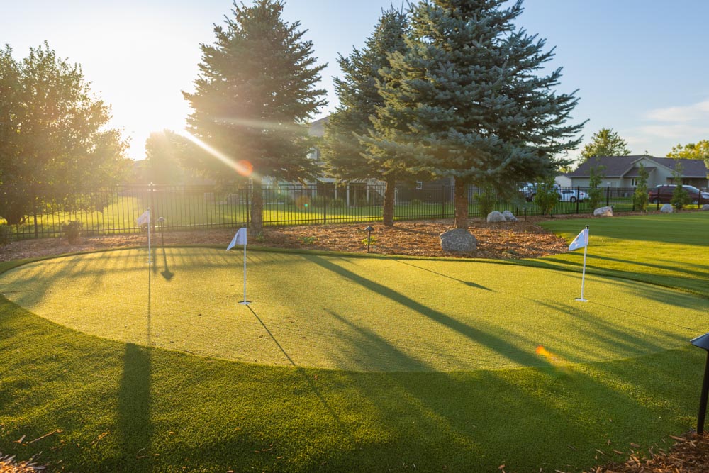 Artificial turf putting green