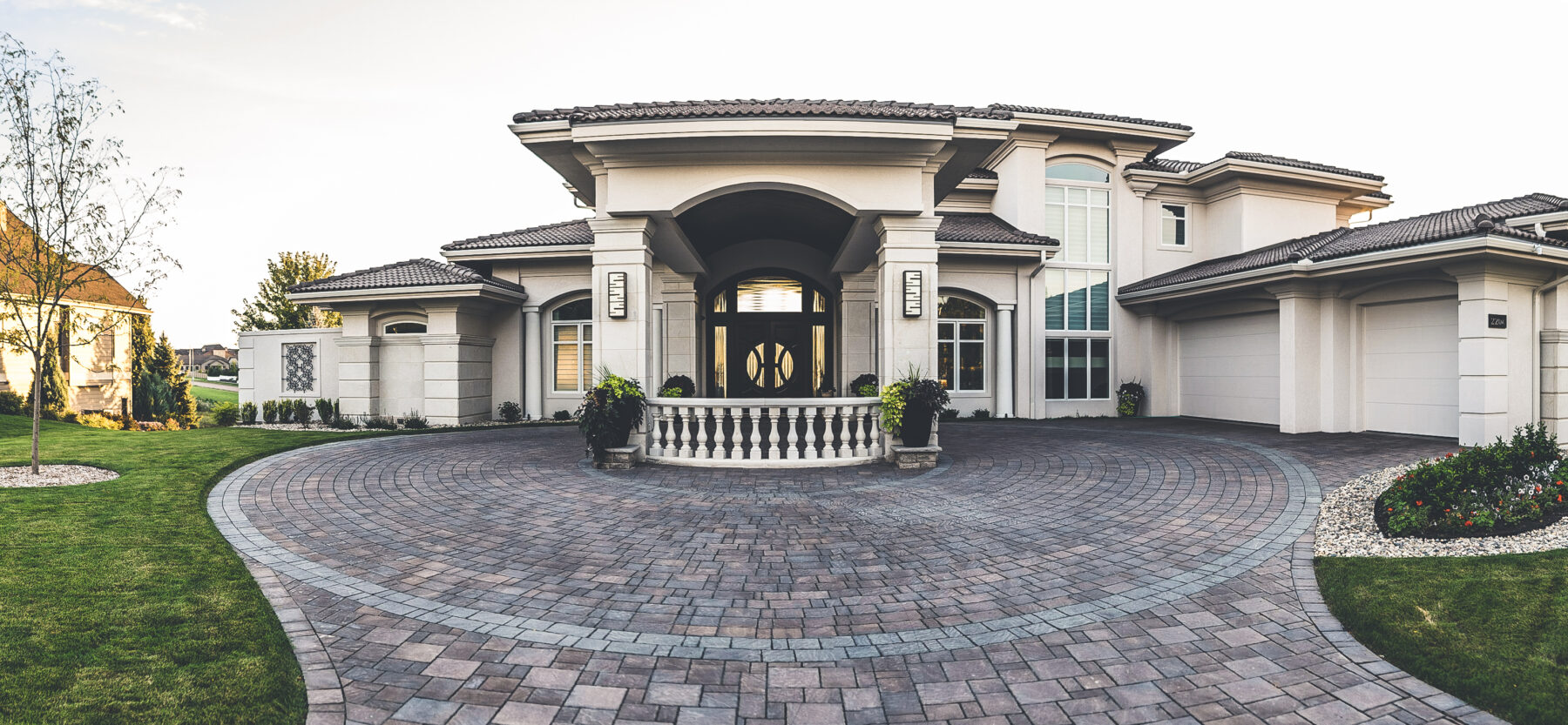 grand patio entrance by Weller Brothers Landscaping