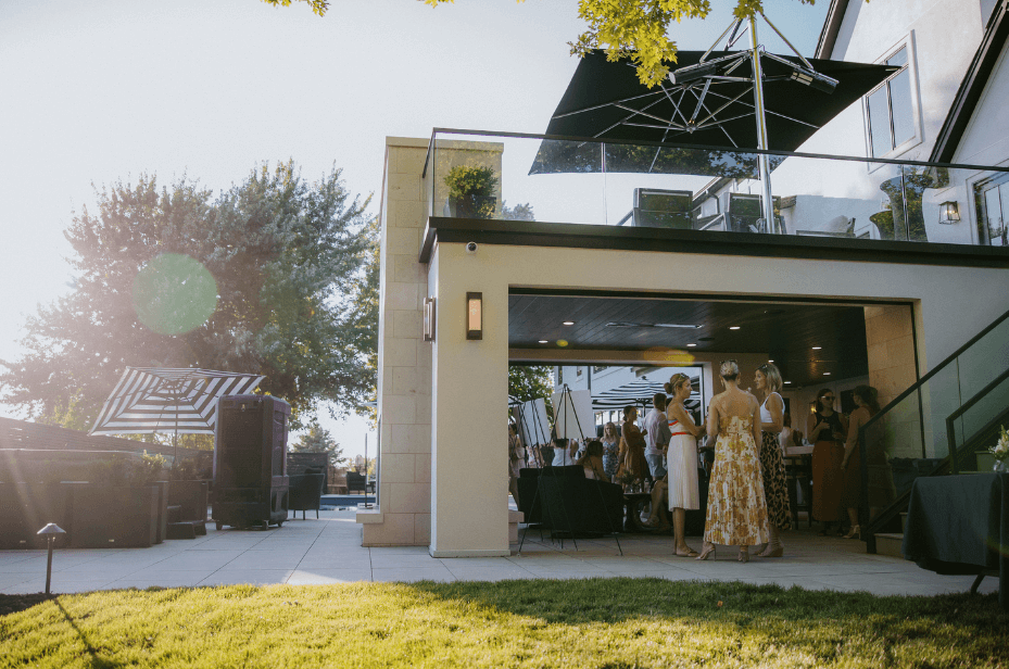 women enjoying an outoor patio