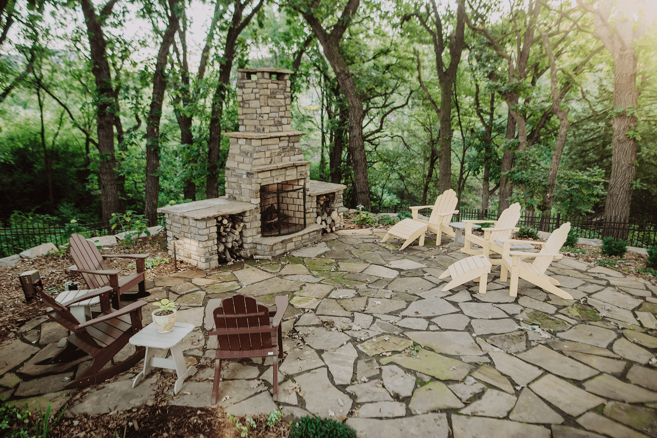 natural stone patio area with large custom fireplace