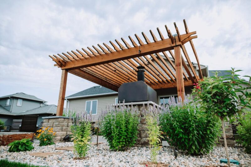 Pergola with an outdoor kitchen, Weller Brothers Landscaping