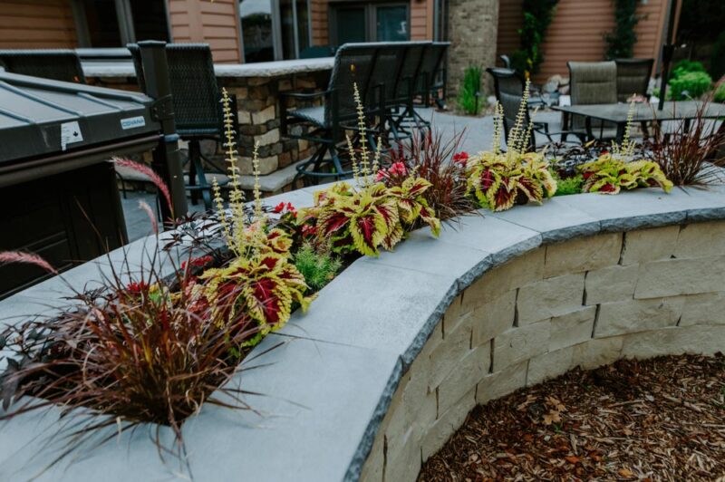 Raised patio Planter with Flowers, Weller Brothers Landscaping