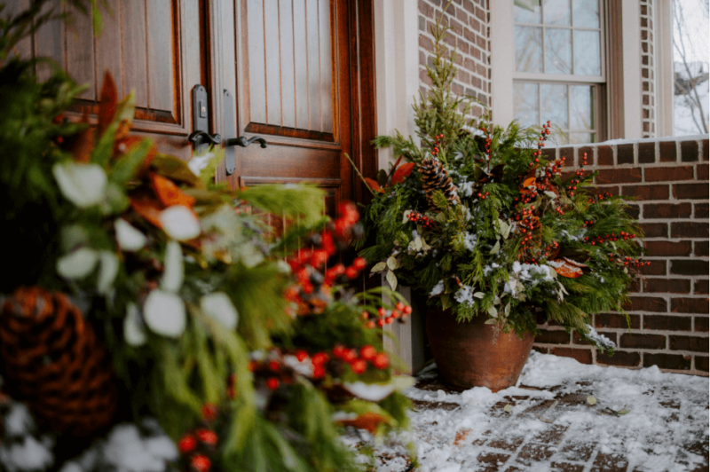 Decorative Christmas pots on the front porch