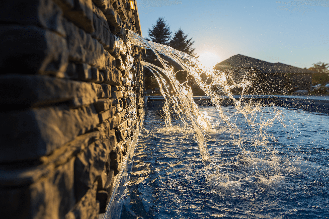 water fountain in backyard pool