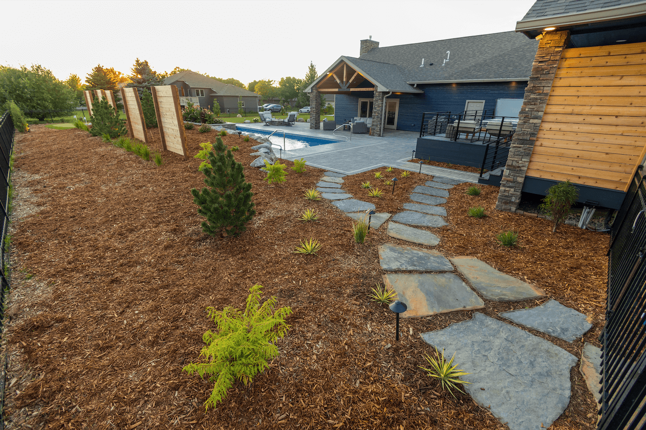 mulch and plant landscaping by Weller Brothers