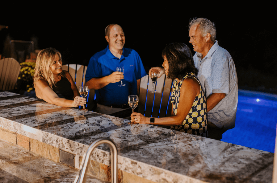 Enjoying wine in outdoor kitchen