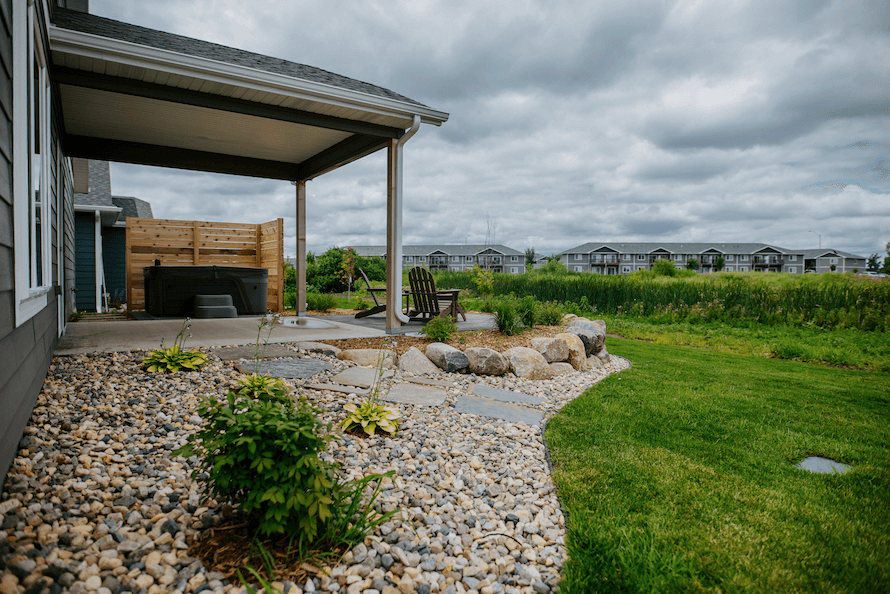 Sioux Falls backyard with a simple patio and beautiful landscape
