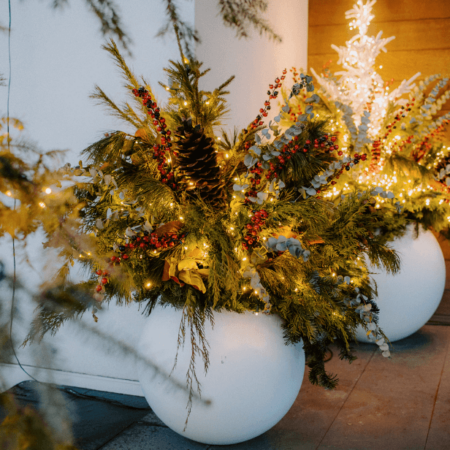 holiday planters on a front porch