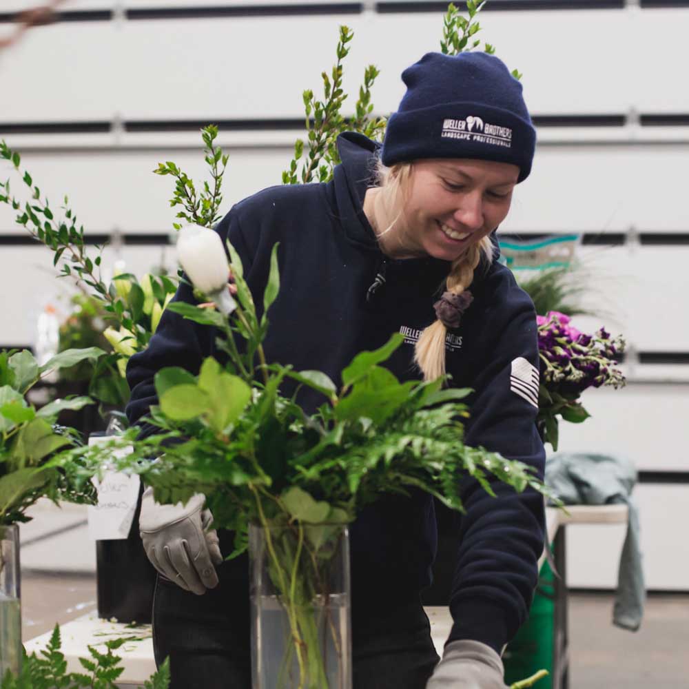 Cassidy Phen working on a Spring Floral Arrangement