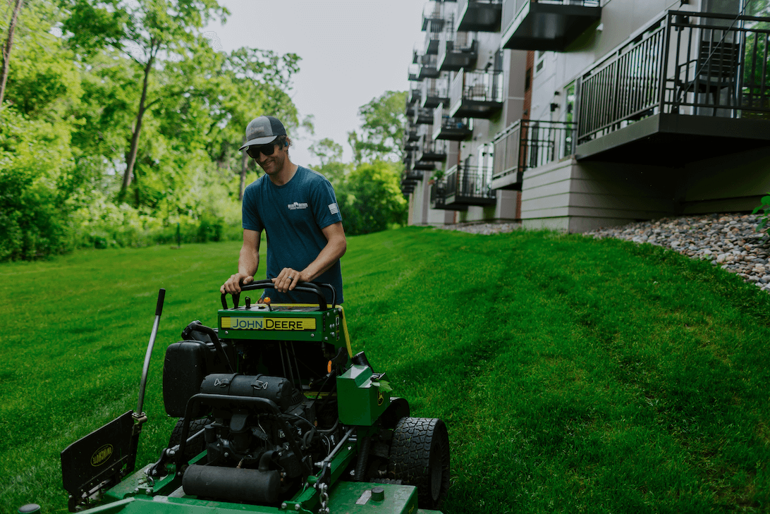 Weller Brothers lawn maintenance employee