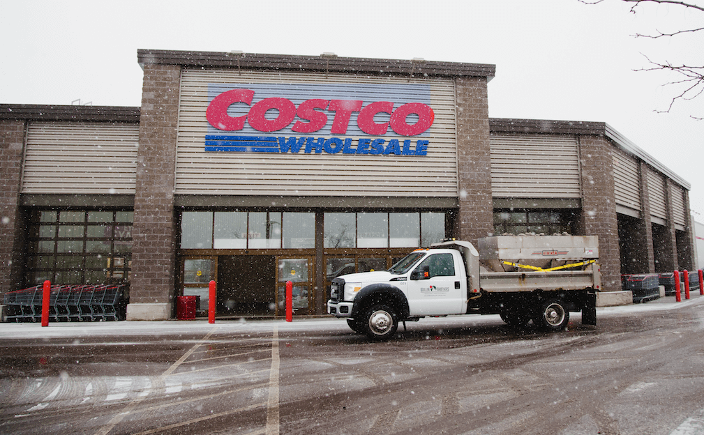 Weller Brothers truck doing parking lot de-icing at Costco in Sioux Falls