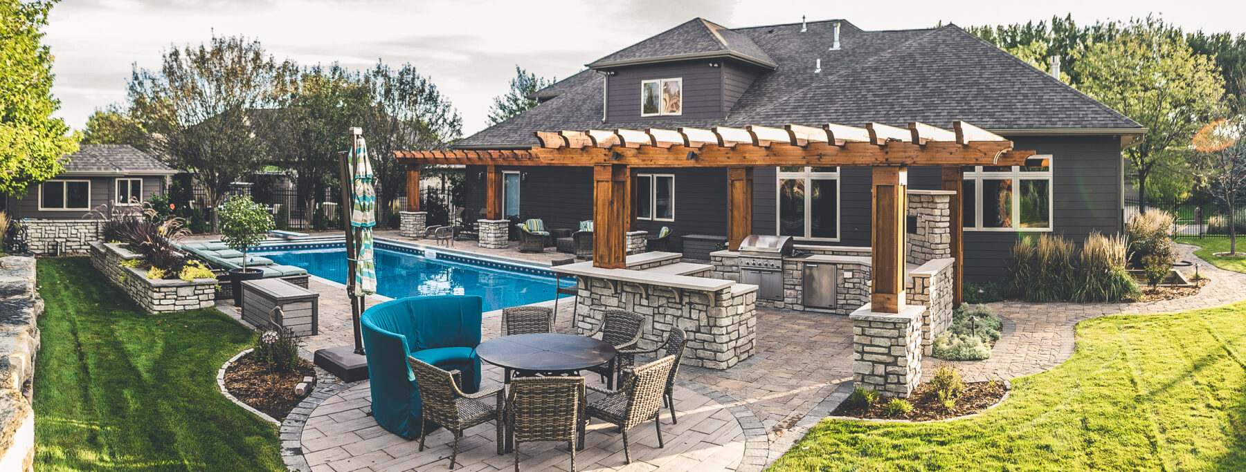 Custom patio, pergola, and pool