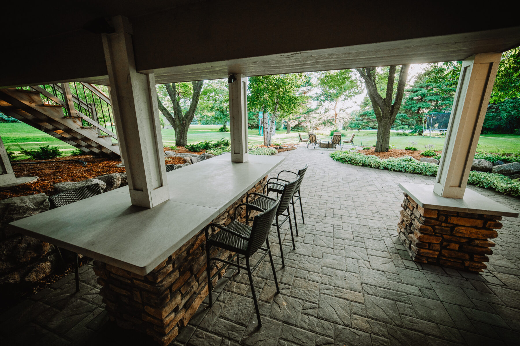 outdoor kitchen and bar by Weller Brothers Landscaping