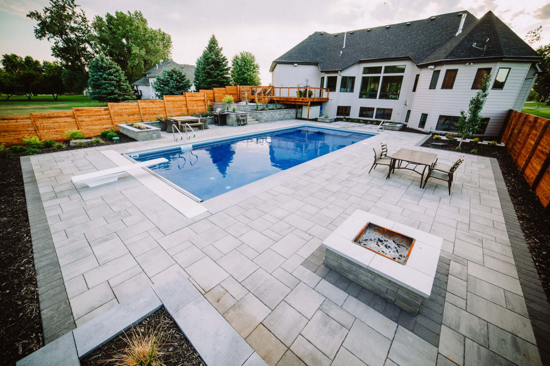 backyard pool and fire pit