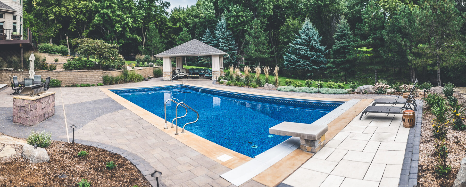 custom backyard pool with starting block