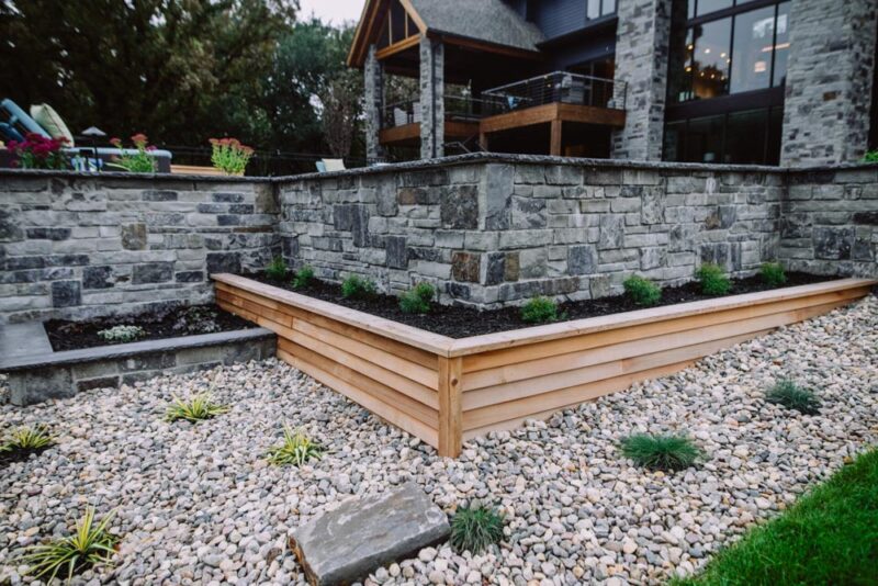 Retaining wall in a modern style with wood framing, Weller Brothers Landscaping